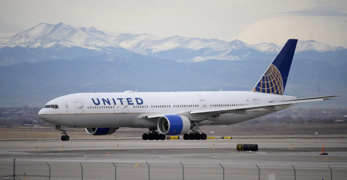 A United Airlines jetliner taxis to a runway for take off from Denver International Airport on Dec. 27, 2022. (David Zalubowski/AP Photo)