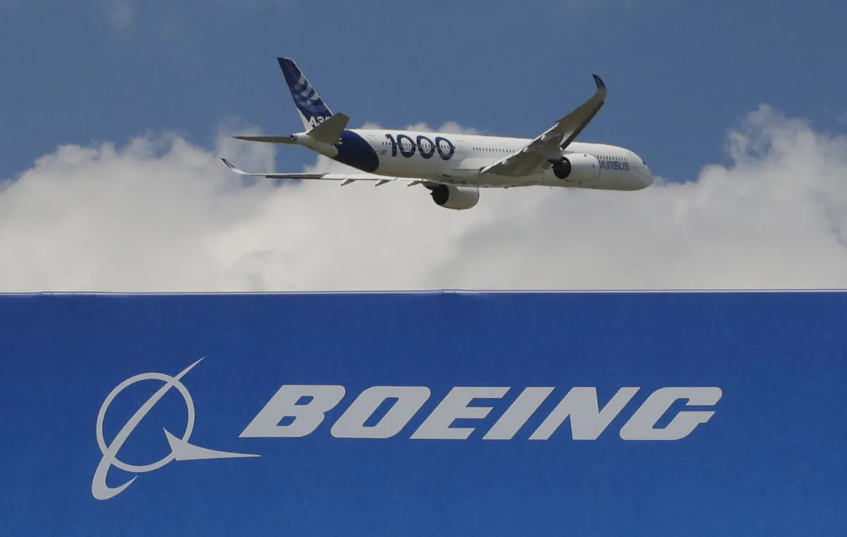 An Airbus A 350 - 1000 performs a demonstration flight at Paris Air Show in Le Bourget, east of Paris, on June 17, 2019. (Michel Euler/AP Photo)