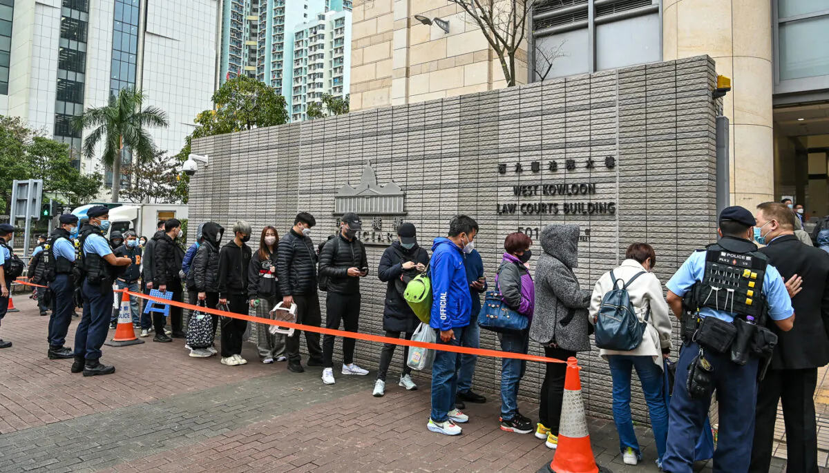 People queuing to enter West Kowloon Magistrates' Court, Hong Kong, on Feb 7, 2023. (Sung Pi-long/The Epoch Times)
