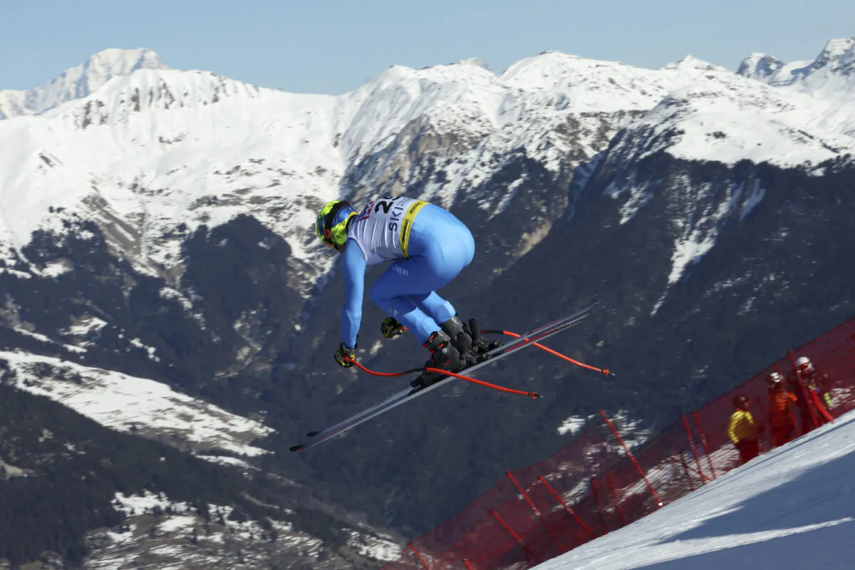 Italy's Christof Innerhofer is airborne during an alpine ski, men's World Championships downhill training, in Courchevel, France, on Feb. 10, 2023. (Alessandro Trovati/AP Photo)