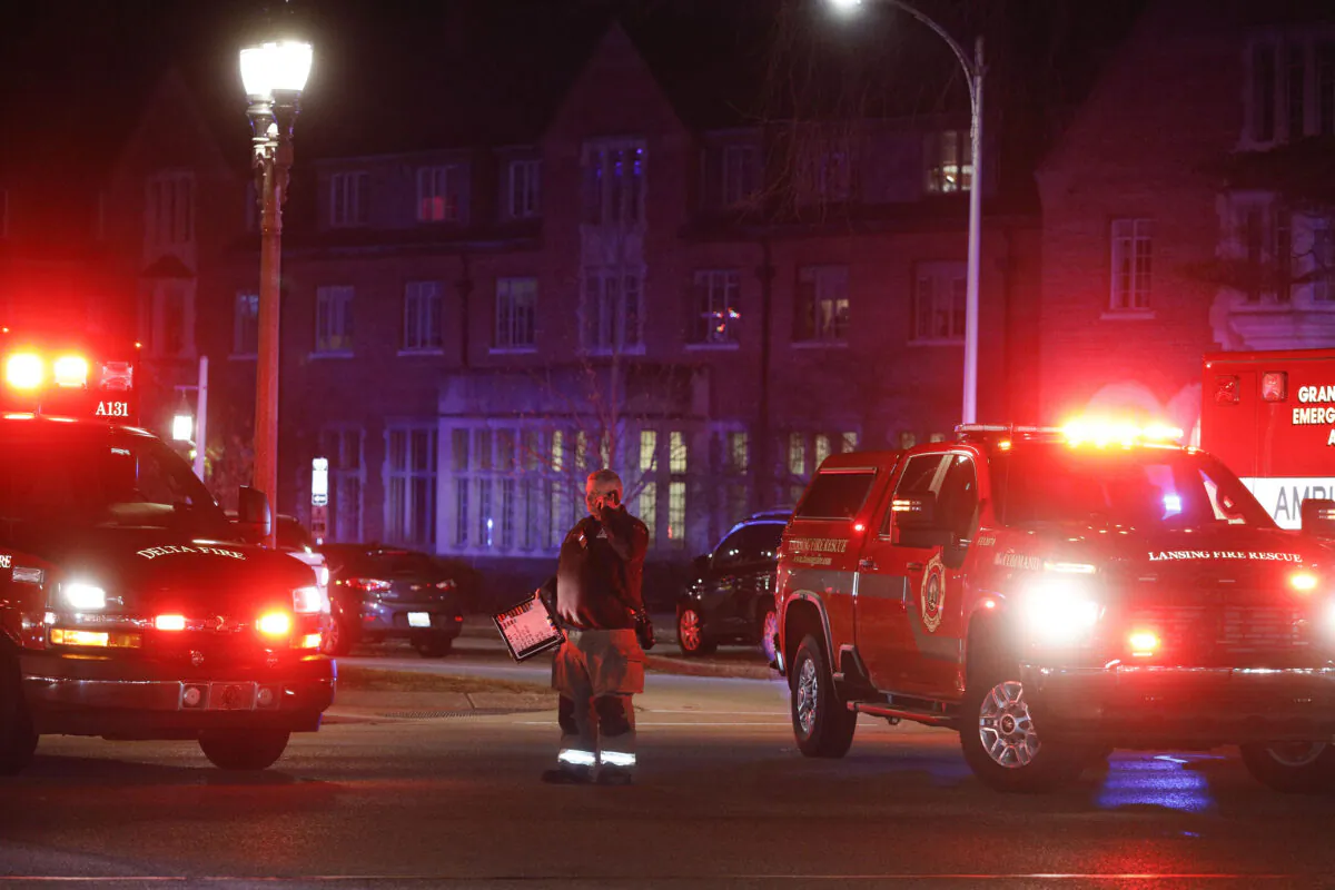Police and emergency vehicles are on the scene of an active shooter situation on the campus of Michigan State University in Lansing, Mich., on Feb. 13, 2023. (Bill Pugliano/Getty Images)