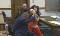 Woman Accused in Dismemberment Slaying Attacks Her Attorney