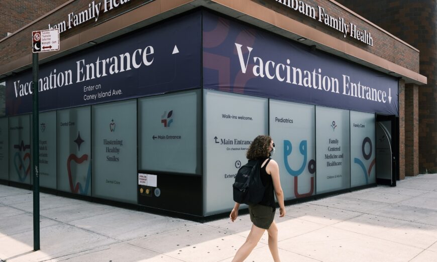 A woman walks past a doctor's office in New York City on July 26, 2021. (Spencer Platt/Getty Images)