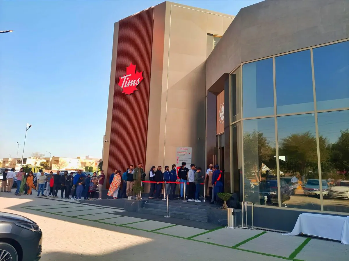 Customers wait in line outside a new Tim Hortons in Lahore, Pakistan, on Feb. 12, 2023. The Canadian coffee chain opened its first coffee shop in Pakistan on Feb. 11, 2023. (Courtesy of Kinza Hashim)