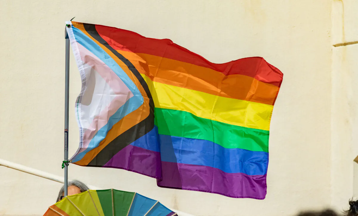 An LGBT flag fly's in Huntington Beach, Calif., on Feb. 14, 2023. (John Fredricks/The Epoch Times)