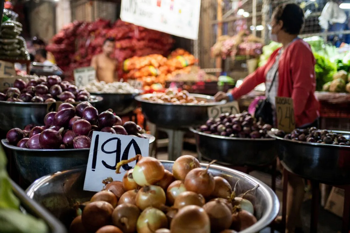 Onions are displayed at a stall at a public market in Manila, Philippines, on Jan. 28, 2023. (Lisa Marie David/Reuters)
