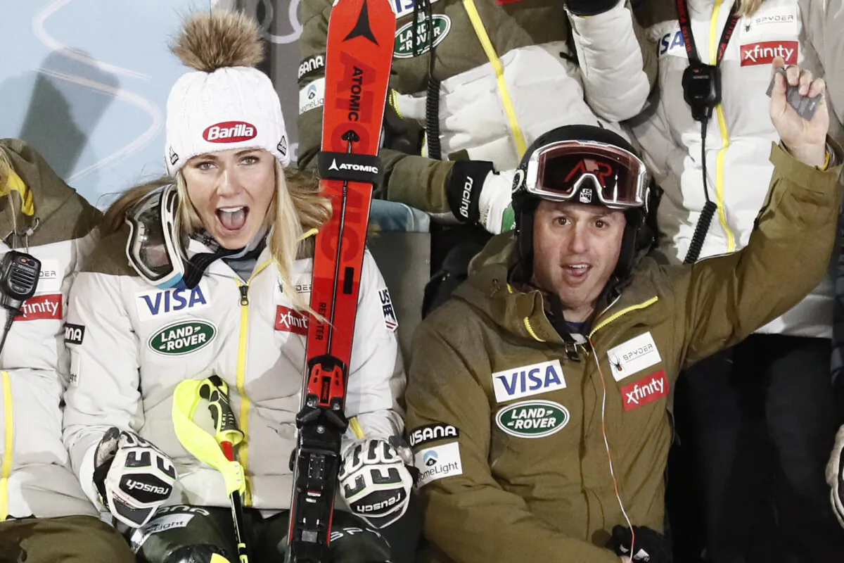 United States' Mikaela Shiffrin sits next to coach Mike Day in Zagreb, Croatia, on Jan. 4, 2020. (Gabriele Facciotti/AP Photo)