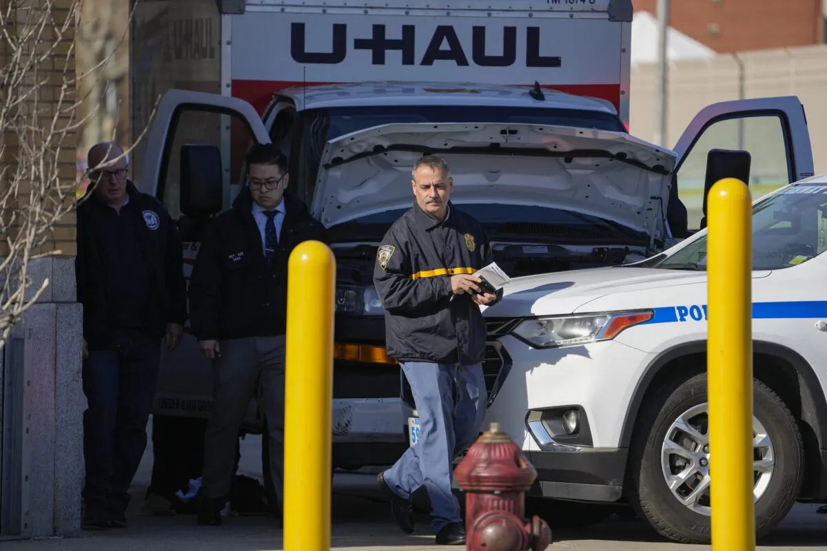 New York Police chief of intelligence Thomas Galati (R) investigates the scene where a rental truck was stopped and the driver arrested in New York on Feb. 13, 2023. (John Minchillo/AP Photo)
