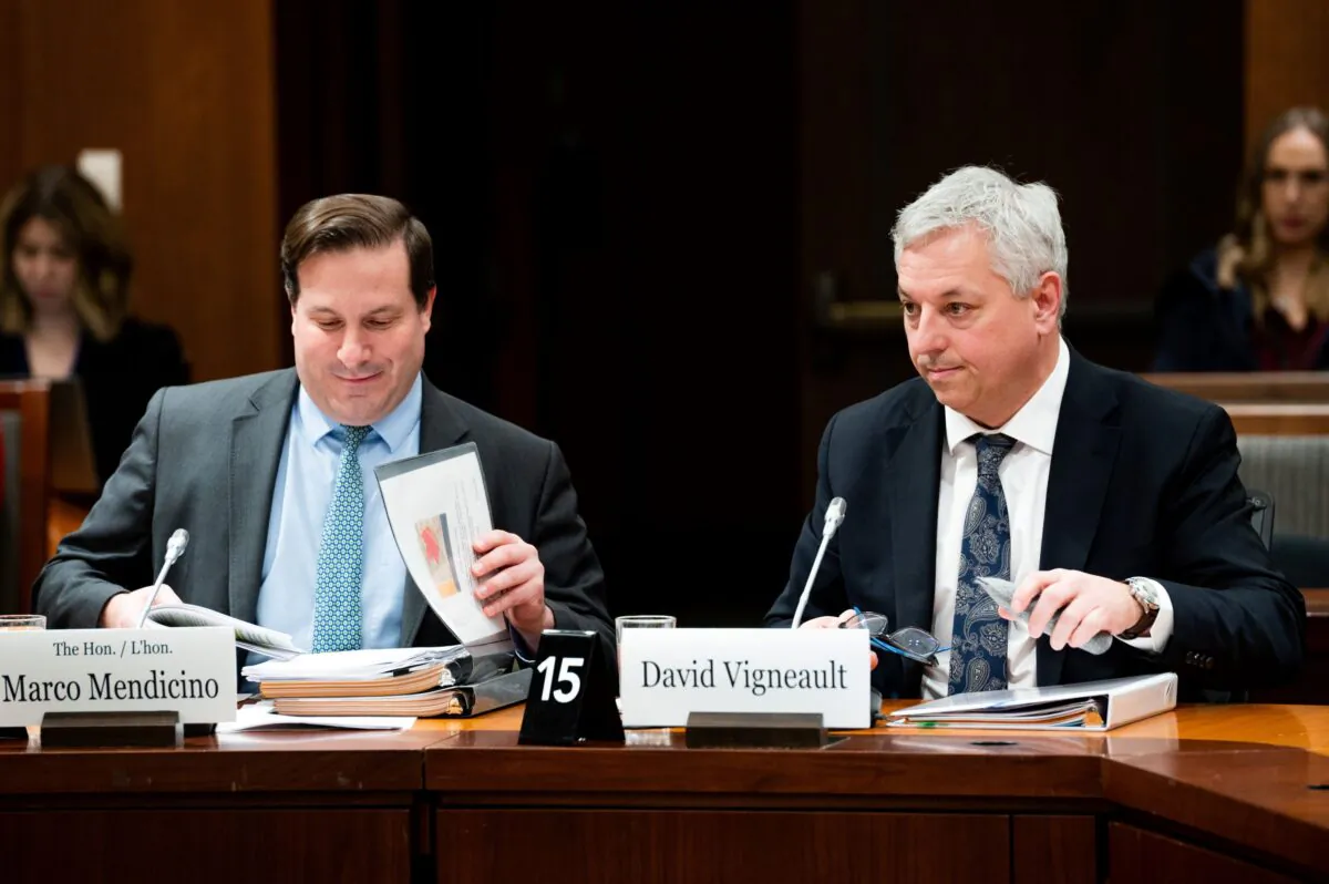 Public Safety Minister Marco Mendicino (L) and CSIS director David Vigneault wait to appear before the Special
Committee on Canada-China Relations on Parliament Hill in Ottawa on Feb. 6, 2023. (The Canadian Press/Spencer Colby)
