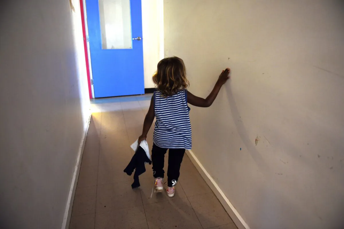 A child is seen at the Alice Springs Women's Shelter, in Australia, on May 27, 2016. (AAP Image/Dan Peled)