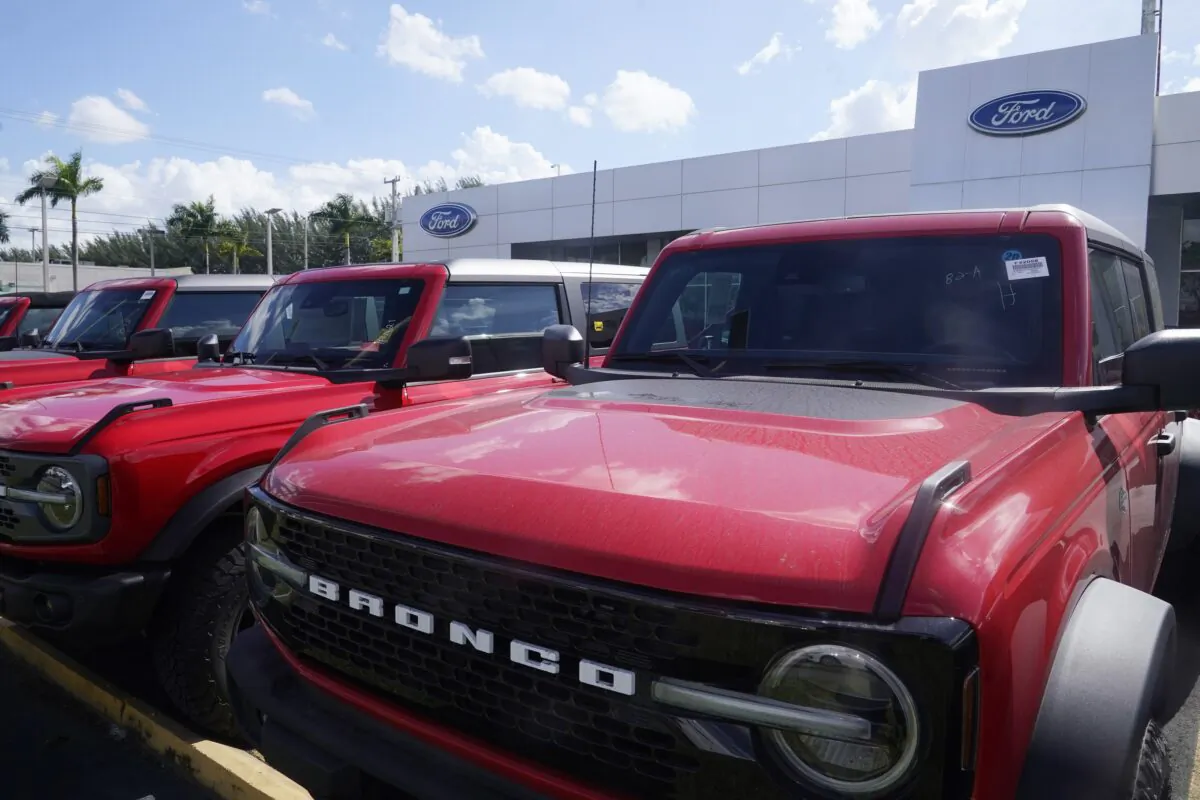 Ford Broncos line the front of Gus Machado's Ford dealership in Hialeah, Fla., on Jan. 23, 2023. (Marta Lavandier/AP Photo)