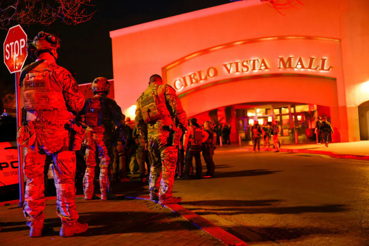 Law enforcement members gather outside the Cielo Vista Mall after a shooting, in El Paso, Texas, on Feb. 15, 2023. (Jose Luis Gonzalez/Reuters)