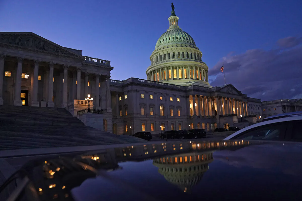 The sun sets over the U.S. Capitol building in Washington on Jan. 5, 2023. (Nathan Howard/Getty Images)