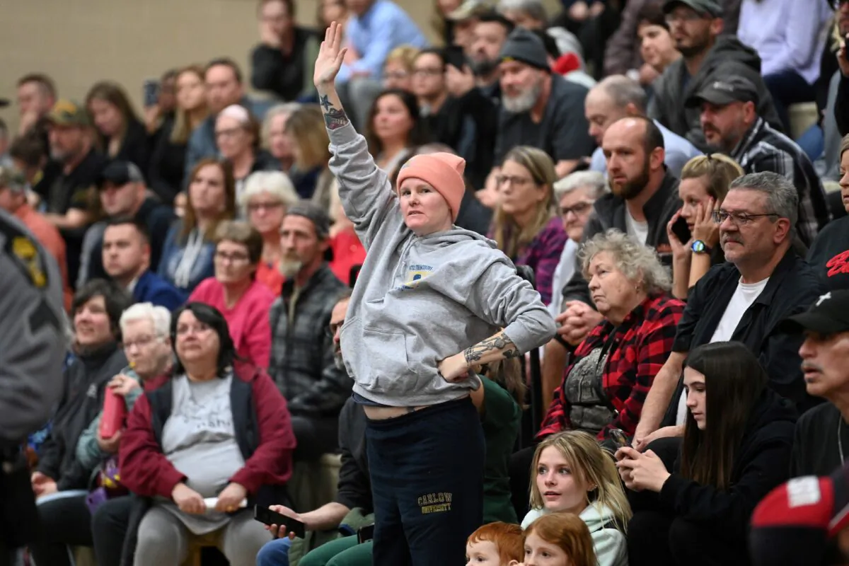 Members of the community gather to discuss their safety and other environmental concerns at a town hall meeting following a train derailment that spilled toxic chemicals, in East Palestine, Ohio, on Feb. 15, 2023. (Alan Freed/Reuters)