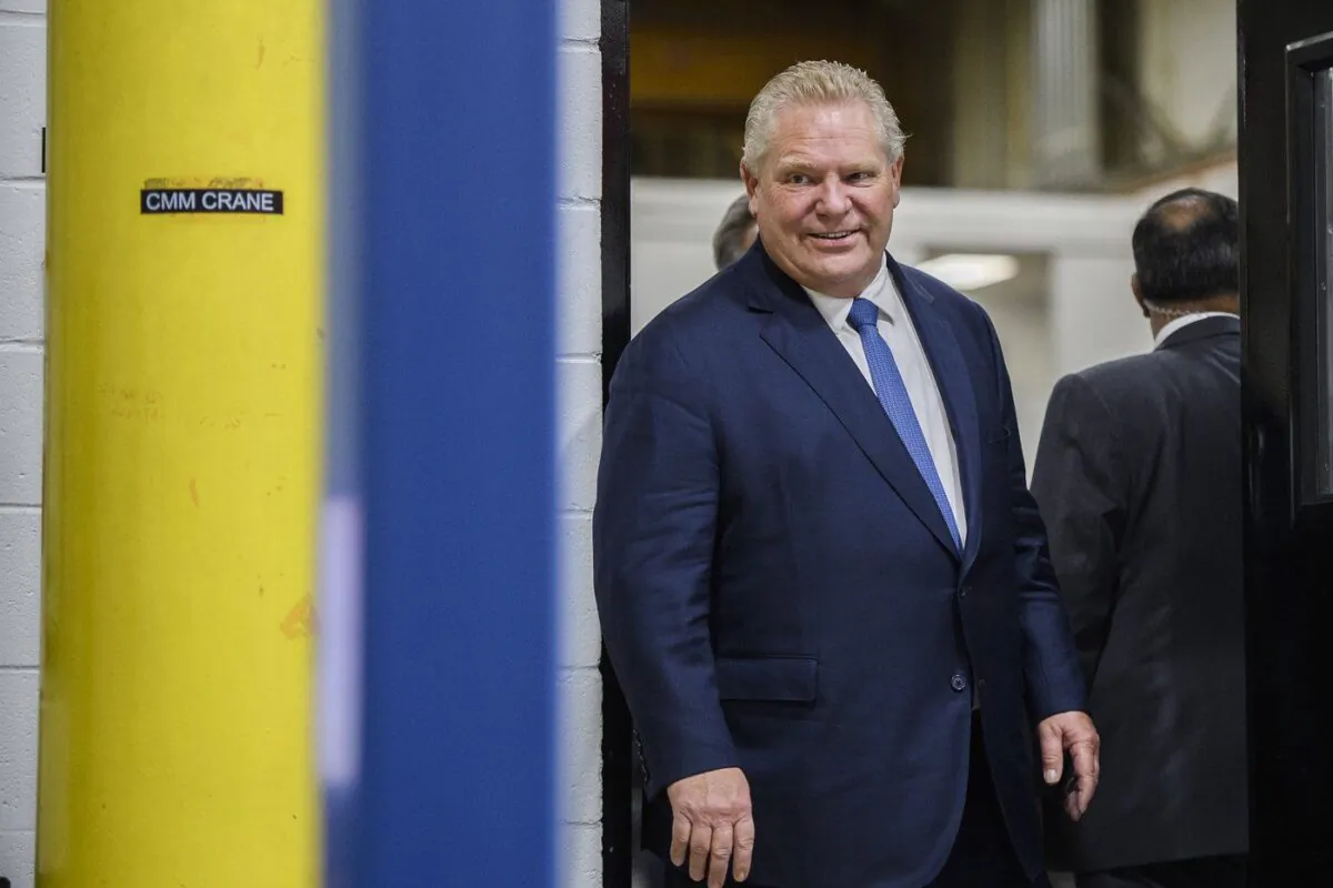 Ontario Premier Doug Ford tours a laboratory in Brampton, Ont., on Feb. 15, 2023. (The Canadian Press/Christopher Katsarov)
