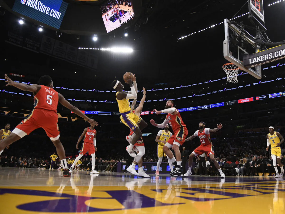 Dennis Schroder (17) of the Los Angeles Lakers shoots over Jonas Valanciunas (17) of the New Orleans Pelicans during the first half in Los Angeles on Feb. 15, 2023. (Kevork Djansezian/Getty Images)