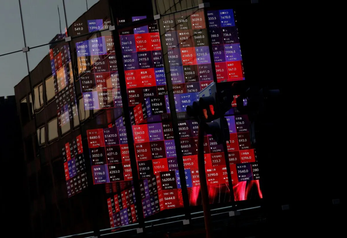 A huge electric stock quotation board is seen inside a building in Tokyo, Japan, on Dec. 30, 2022. (Issei Kato/Reuters)