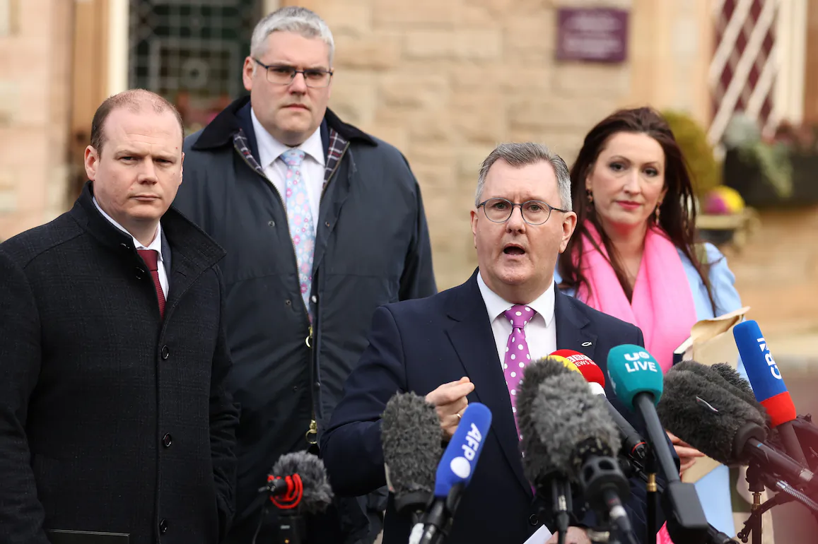(L) Gordon Lyons MLA, Gavin Robinson MP, Sir Jeffrey Donaldson MP, and Emma Little-Pengelly MLA speak to the media outside the Culloden Hotel in Belfast on Feb. 17, 2023.
The party met with UK Prime Minister Rishi Sunak who also held talks with other political leaders over the Northern Ireland Protocol. (PA Media)