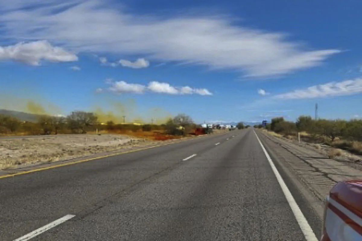 An accident involving a commercial tanker truck causes a hazardous material to leak onto Interstate 10 outside Tucson, Ariz., on Feb. 14, 2023. (Arizona Department of Public Safety via AP)