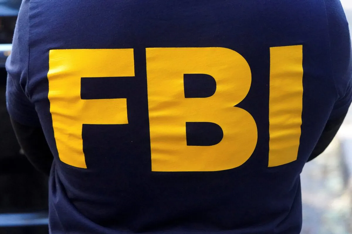 An FBI logo is pictured on an agent's shirt in the Manhattan borough of New York on Oct. 19, 2021. (Carlo Allegri/Reuters)