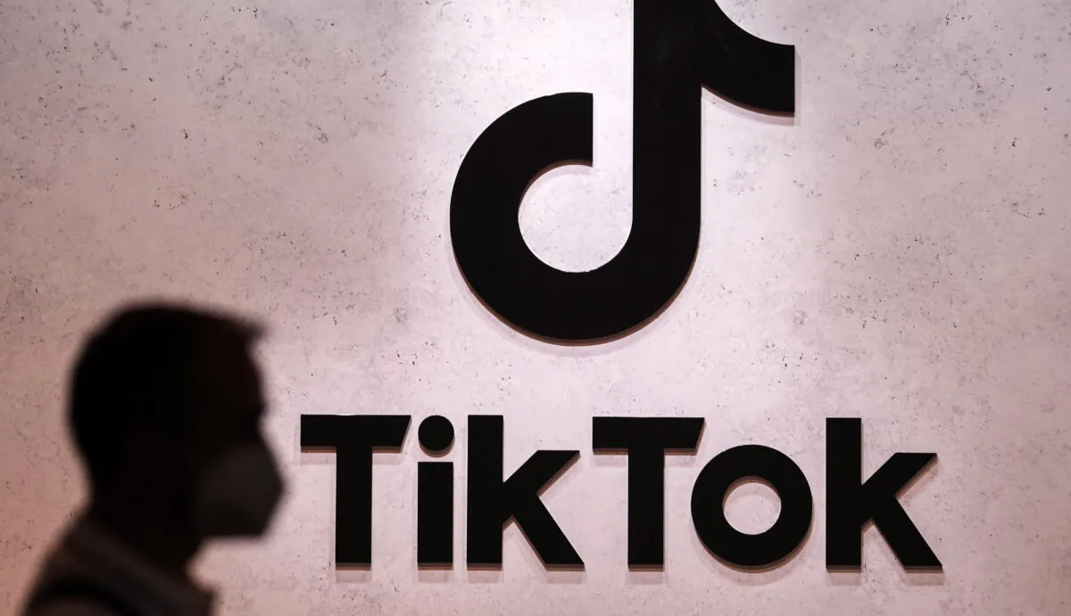 A visitor passes the TikTok exhibition stands at the Gamescom computer gaming fair in Cologne, Germany, on Aug. 25, 2022. (Martin Meissner/AP Photo)
