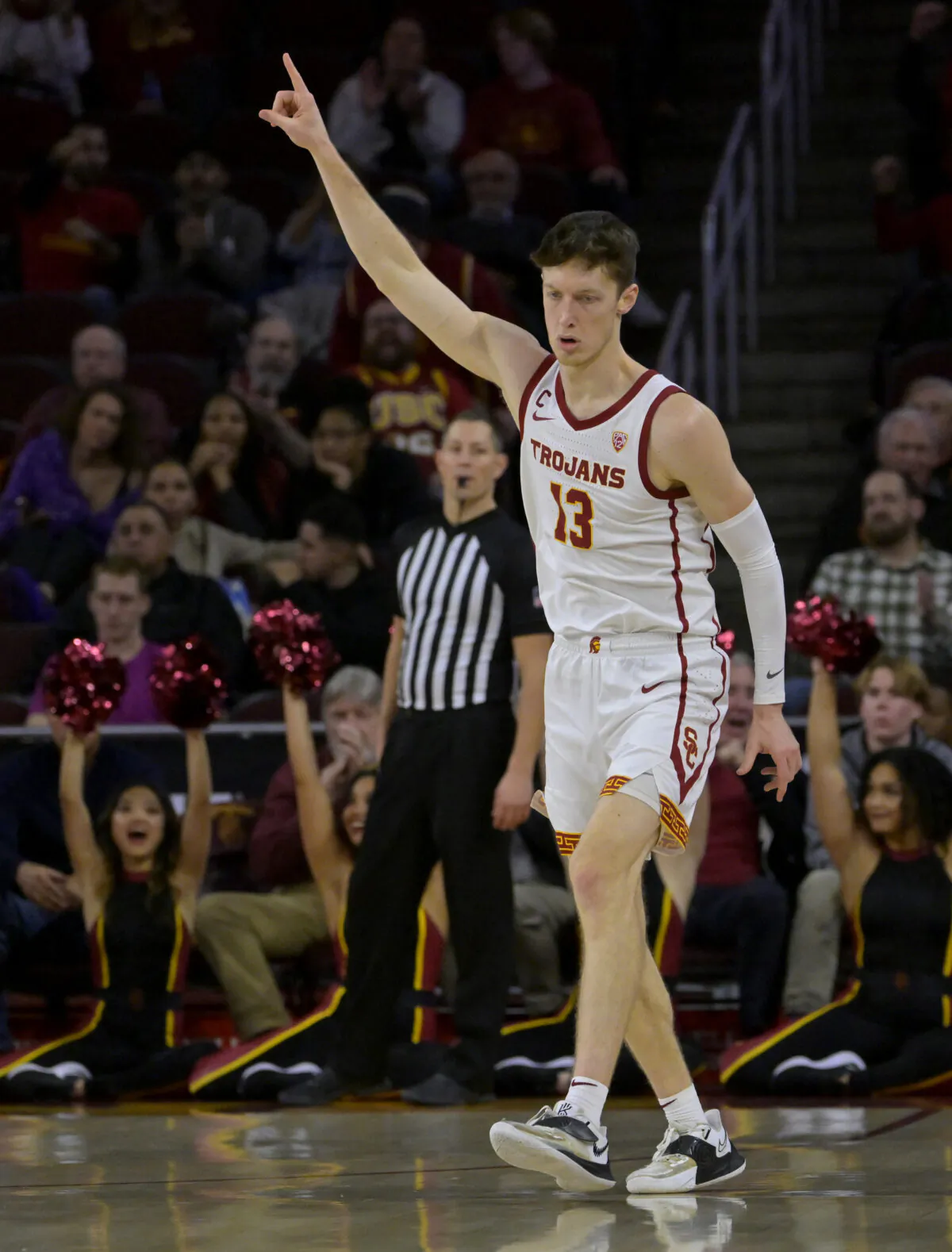 Drew Peterson (13) of the USC Trojans gestures as he heads down court after a 3 point basket in the second half against the Colorado Buffaloes at Galen Center in Los Angeles on January 12, 2023. (Jayne Kamin-Oncea/Getty Images)