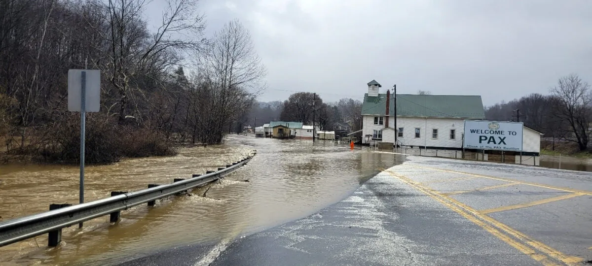 Floodwaters cover a road in Pax, W.Va., on Feb. 17, 2023. (Bob Aaron/WCHS-TV via AP)