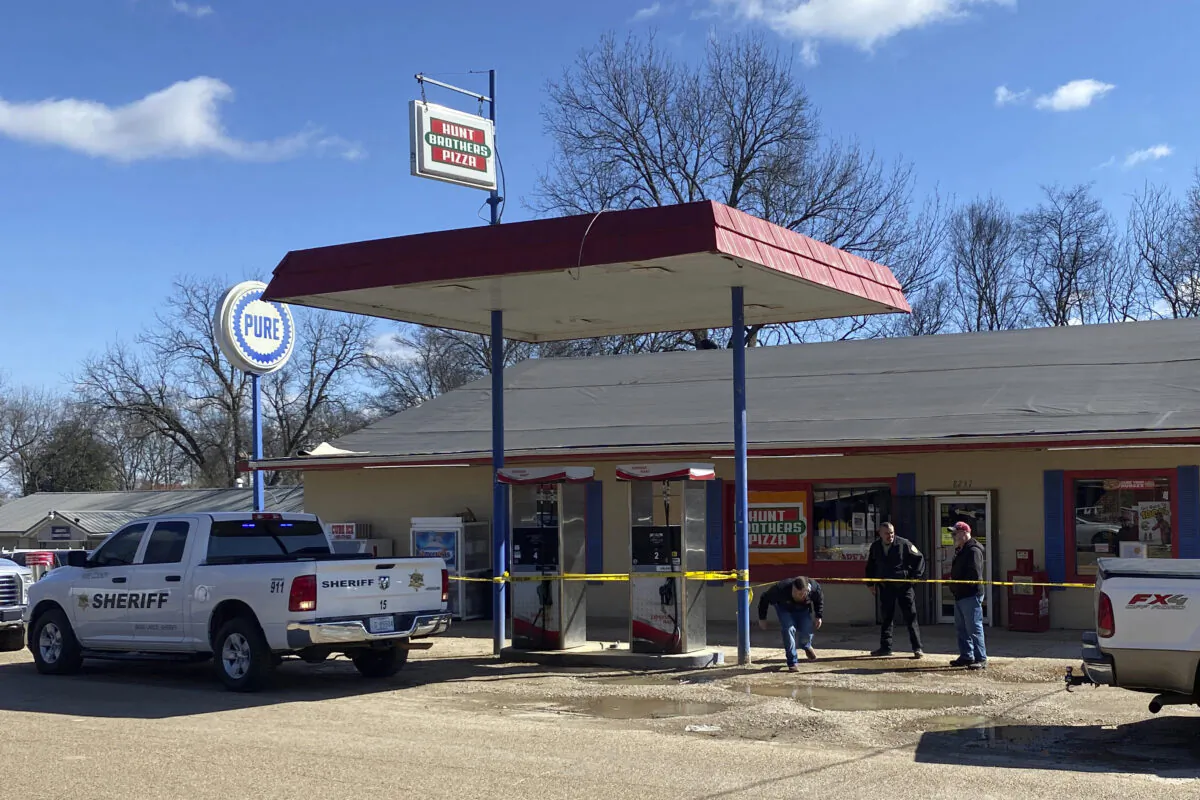 Law enforcement personnel work at the scene of a shooting in Arkabutla, Miss., on Feb. 17, 2023. (Adam Itayem/NewsNation via AP)