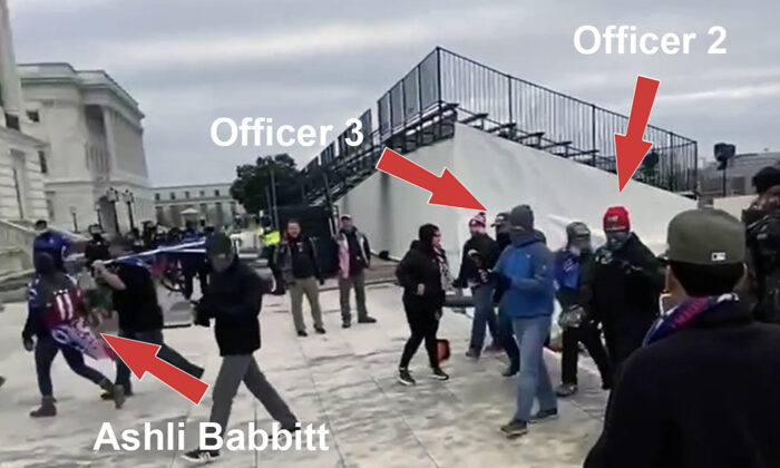 Two undercover Metropolitan Police Department officers walked behind Ashli Babbitt on the northwest side of the Capitol on Jan. 6, 2021. One had earlier remarked that someone will get shot that day. (William Pope via U.S. District Court/Screenshot via The Epoch Times)