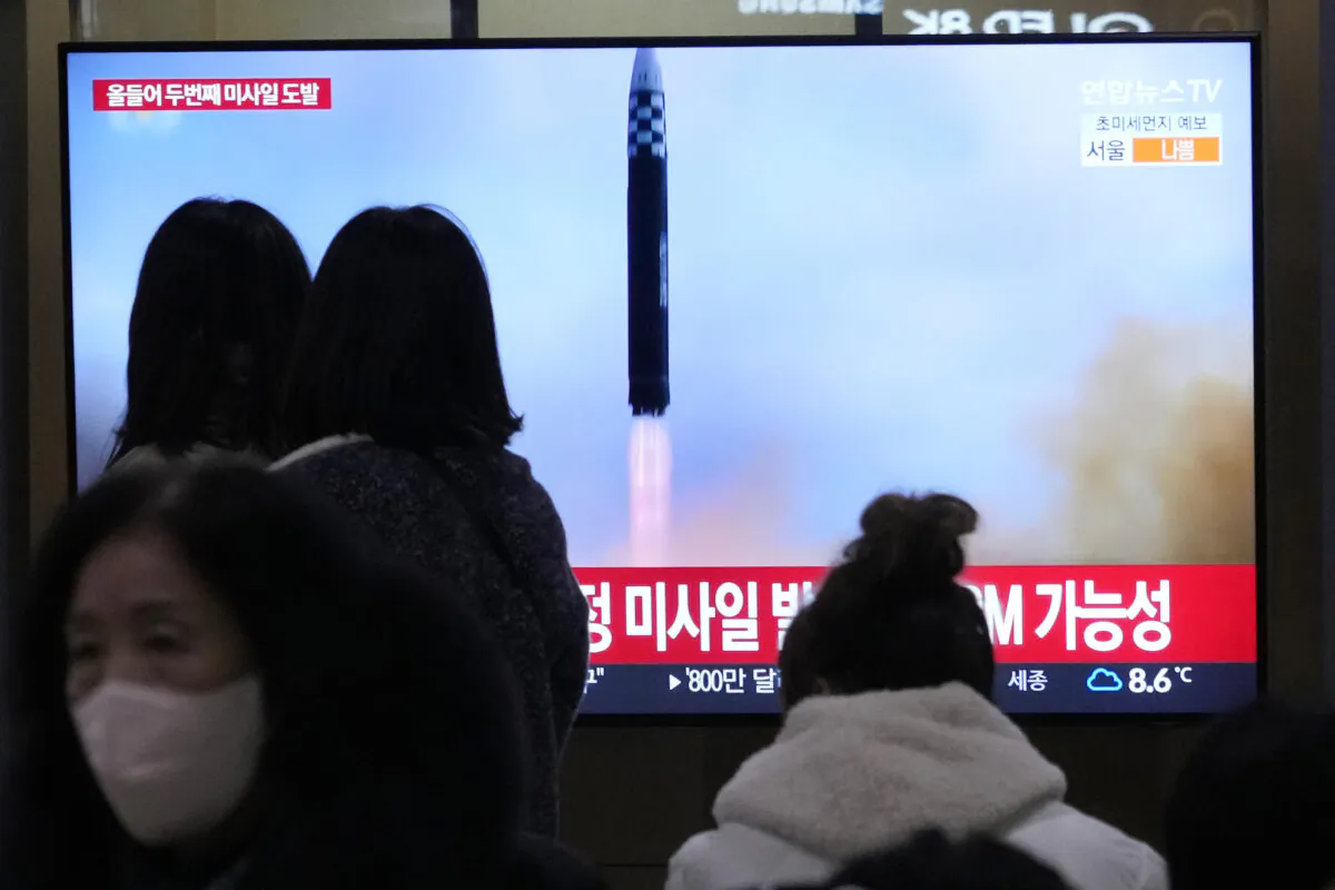A TV screen shows a file image of North Korea's missile launch during a news program at the Seoul Railway Station in Seoul, South Korea, on Feb. 18. 2023. (Ahn Young-joon/AP Photo)