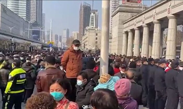 Elderly protest over health insurance cuts in Wuhan city, China, on Feb. 15, 2023. (Screenshot via The Epoch Times)