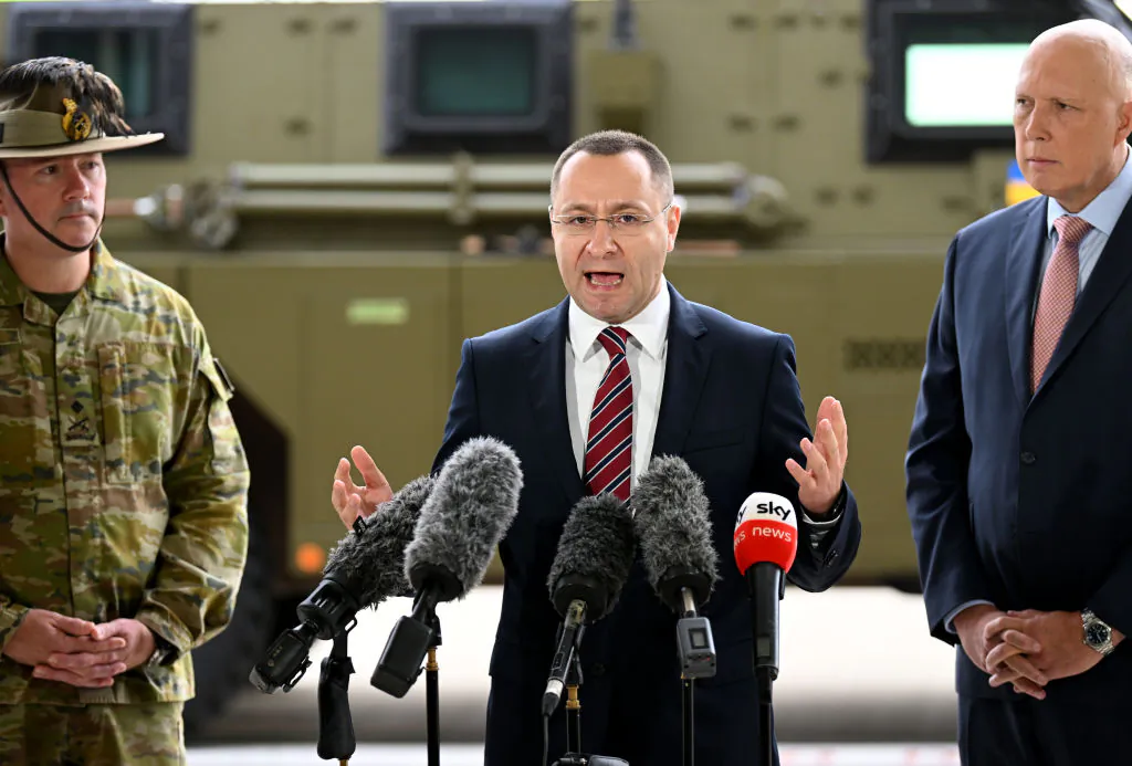 Ambassador of Ukraine to Australia Vasyl Myroshnychenko (C), joined by Australian Defence minister Peter Dutton (R), speaks during a press conference at the Amberley Air Base in Ipswich, Australia, on April 8, 2022. (Dan Peled/Getty Images)