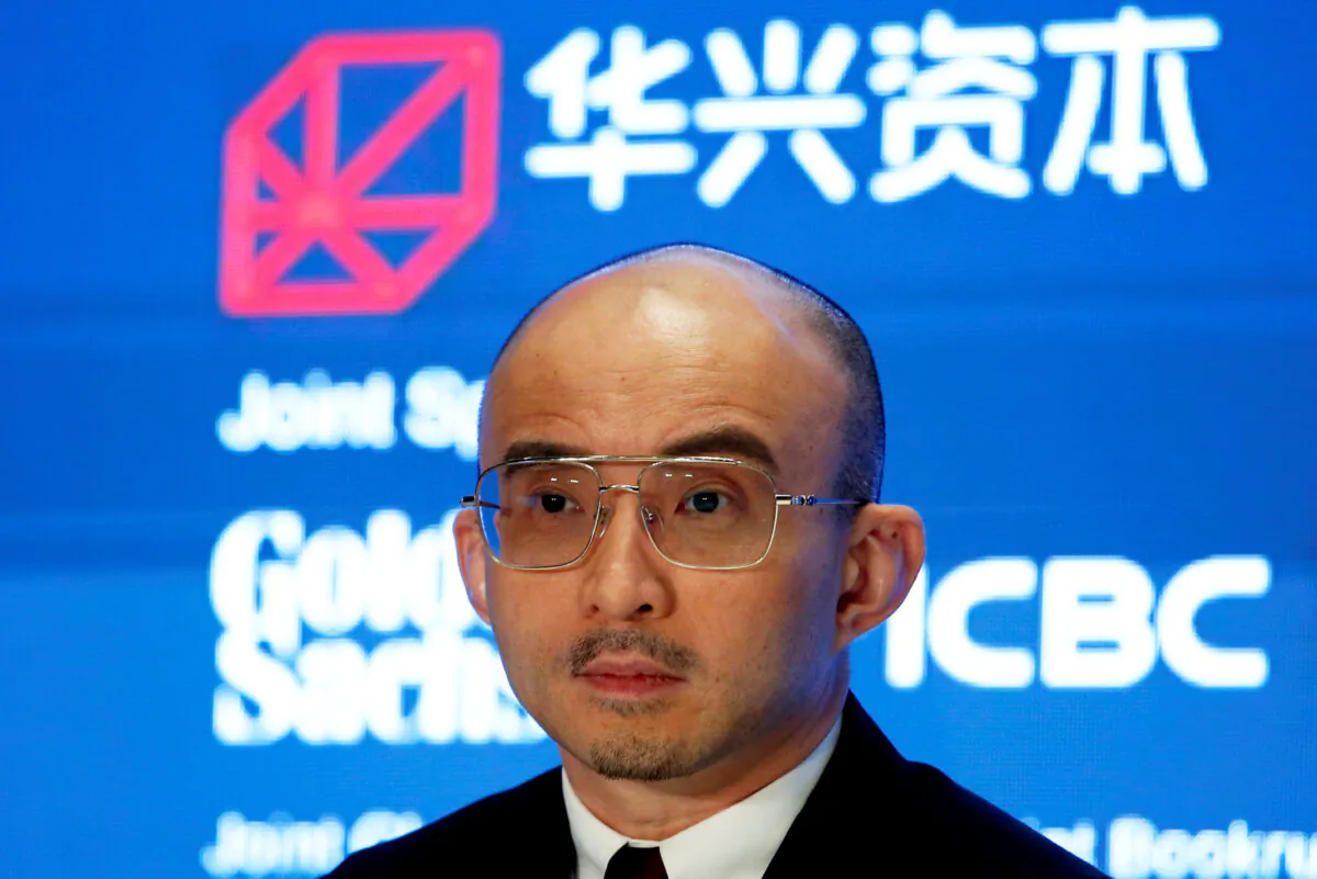 Bao Fan, founder, chairman, and CEO of China Renaissance Group, an investment bank led by one of the country’s most famed rainmakers, holds a news conference on its IPO in Hong Kong on Sept. 13, 2018. (Bobby Yip/Reuters)