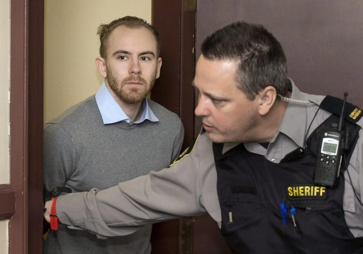 William Sandeson, left, arrives for his preliminary hearing at provincial court in Halifax on Feb. 11, 2016. (The Canadian Press/Darren Calabrese)