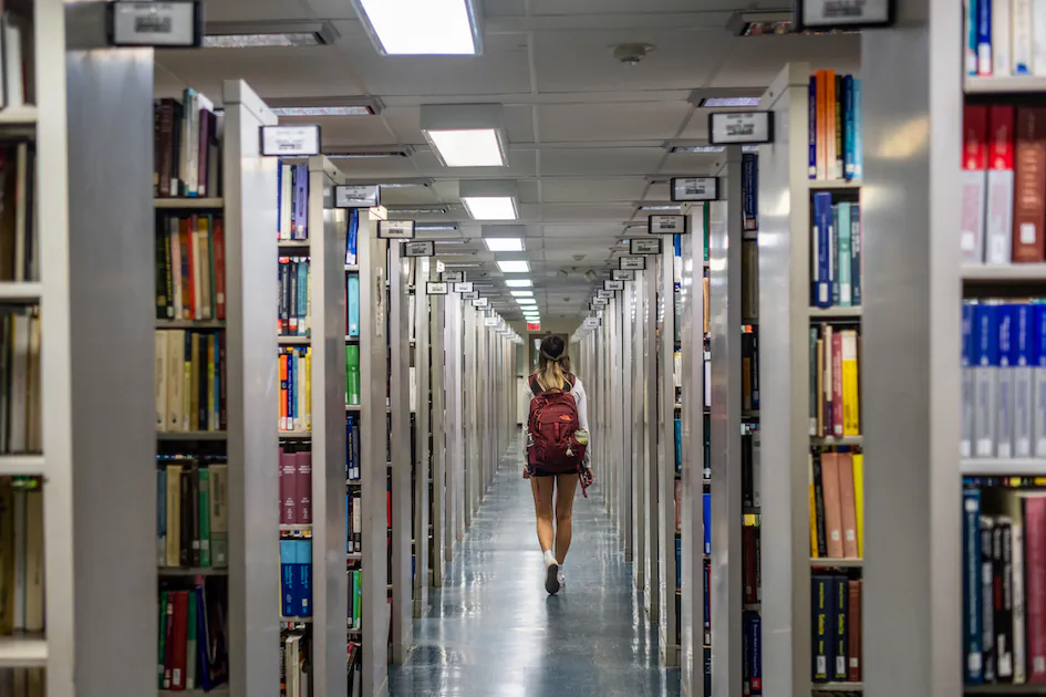 A person walks through the Rice University Library in Houston, Texas, on April 26, 2022. (Brandon Bell/Getty Images)