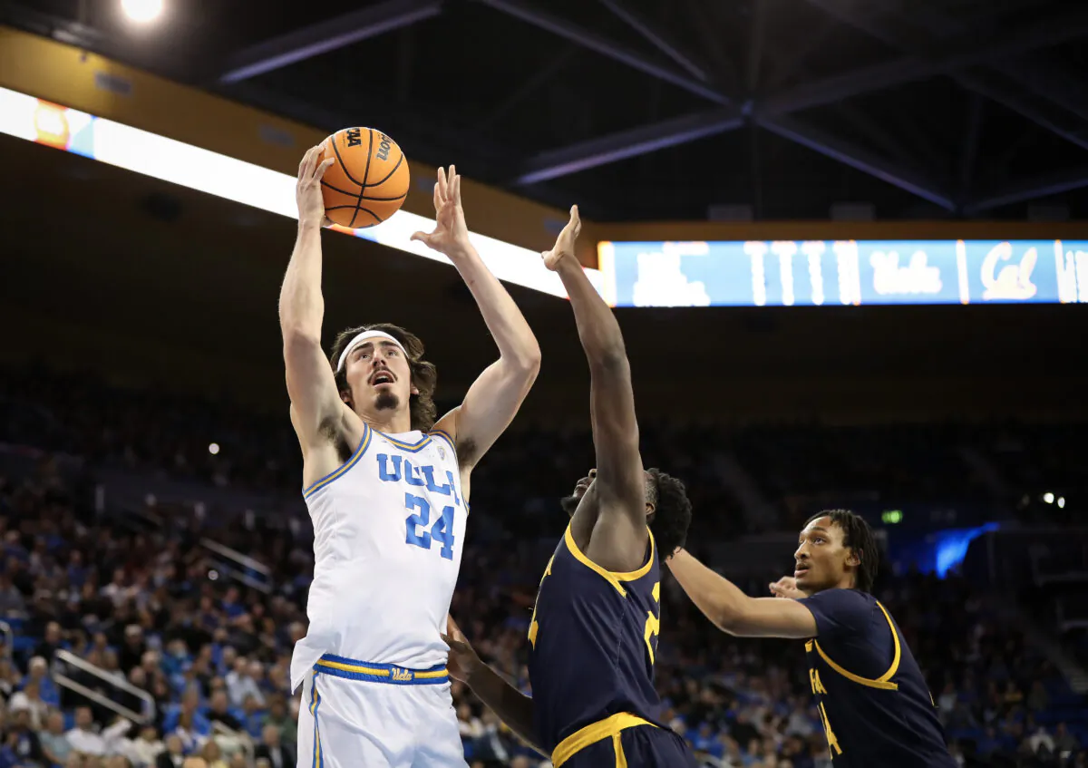 Jaime Jaquez Jr. (24) of the UCLA Bruins drives to the basket against Sam Alajiki (24) of the California Golden Bears in the first half at UCLA Pauley Pavilion in Los Angeles on Feb. 18, 2023. (Meg Oliphant/Getty Images)