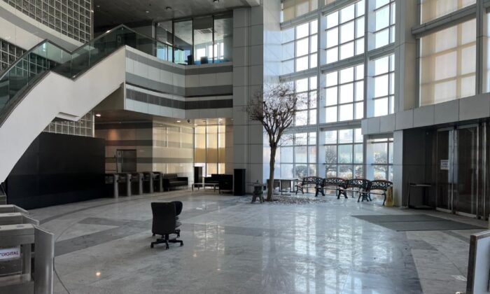 The building lobby of Apple Daily is covered in dust. Feb. 15, 2023. (Courtesy of anonymous Employee/The Epoch Times)