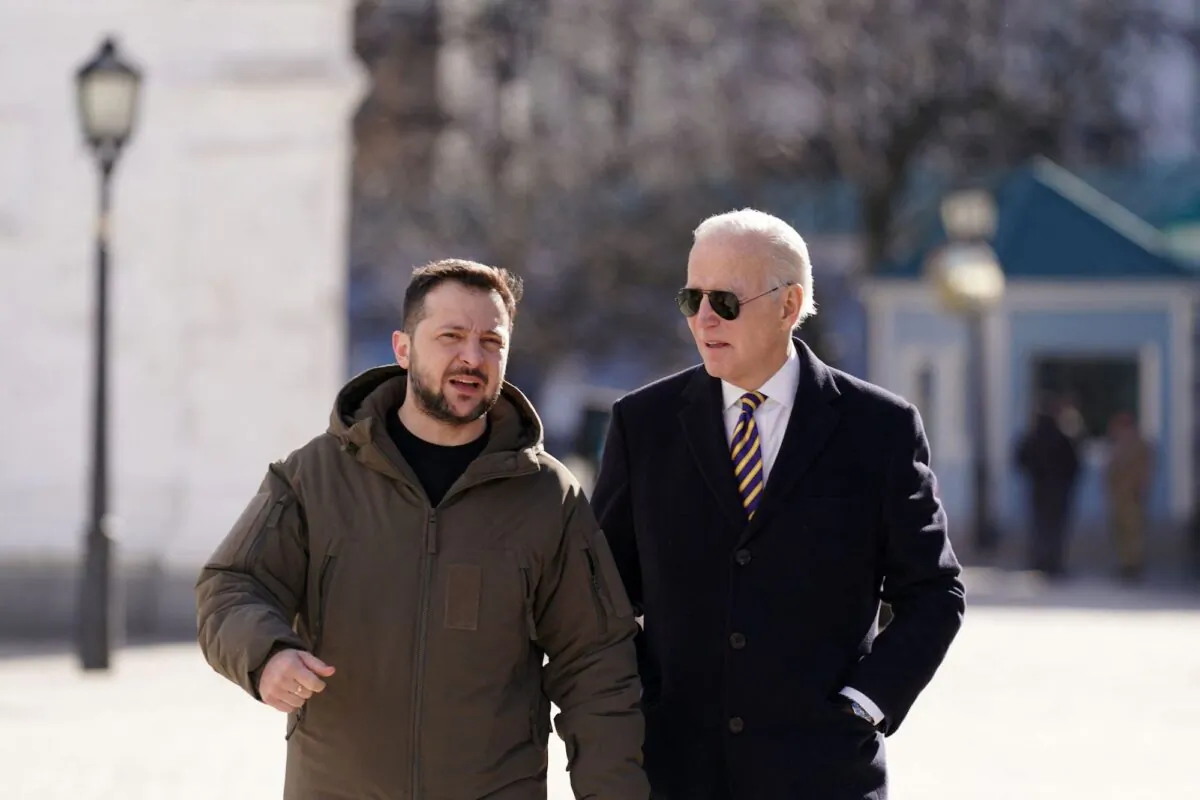 U.S. President Joe Biden walks next to Ukrainian President Volodymyr Zelenskyy (L) as he arrives for a visit in Kyiv, Ukraine, on Feb. 20, 2023. (Dimitar Dilkoff/AFP/Getty Images)