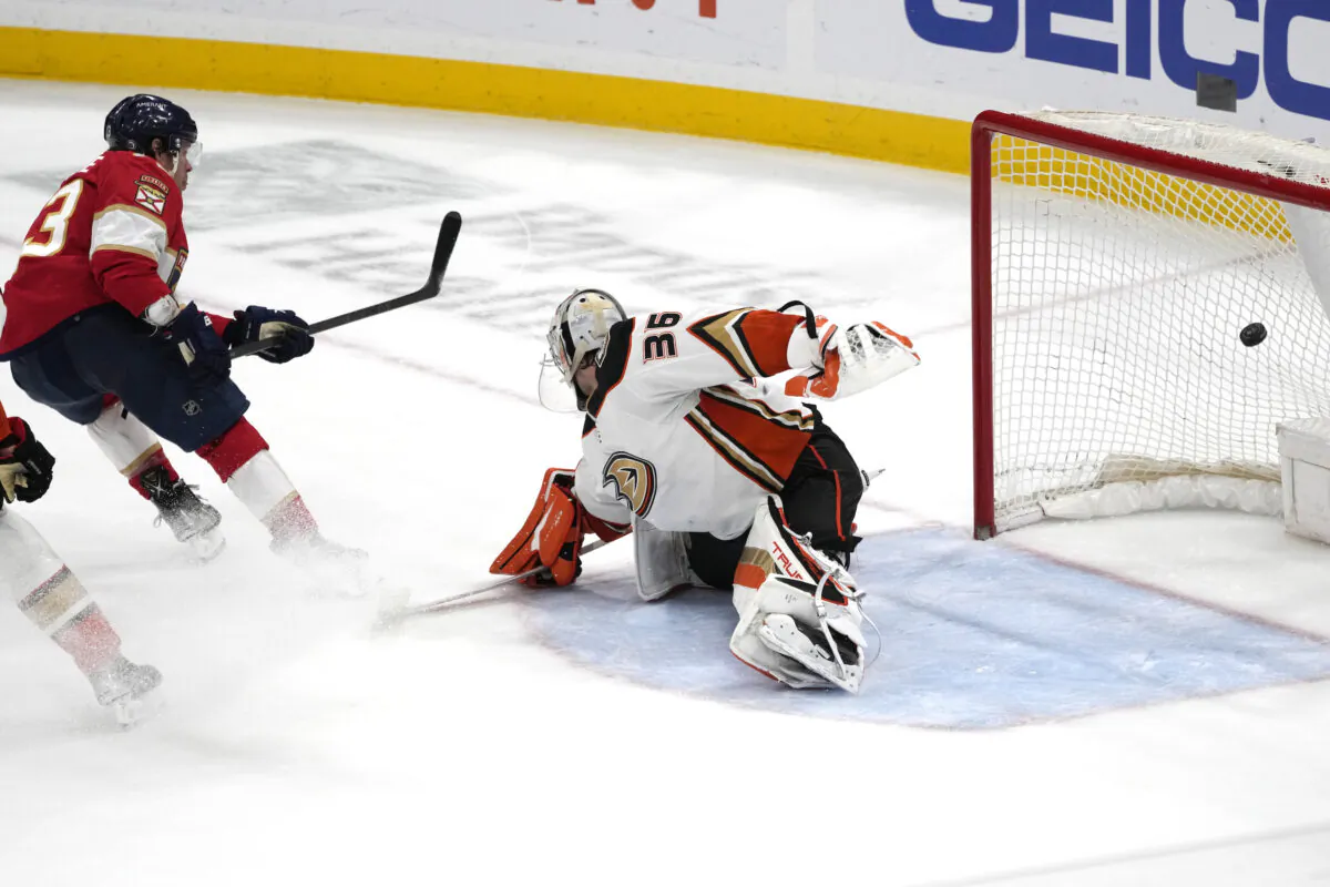 Florida Panthers center Carter Verhaeghe (23) scores the winning goal against San Jose Sharks goaltender Kaapo Kahkonen (36) during overtime of a NHL game, in Sunrise, Fla., on  Feb. 20, 2023. (Marta Lavandier/AP Photo)