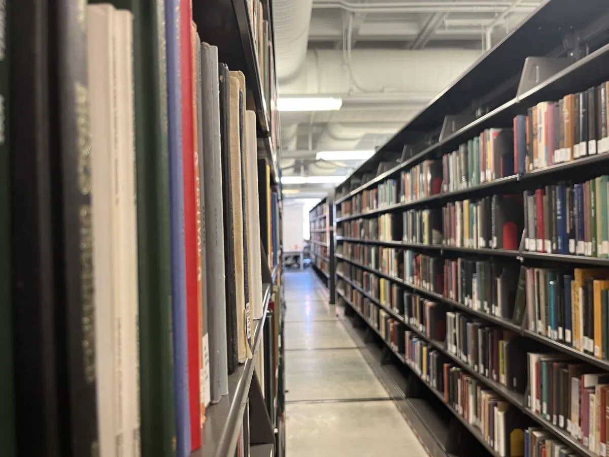 Library books fill the movable stacks in the Smathers Library West at the University of Florida in Gainesville, Fla., on Feb. 20, 2023. (Liberty Holt for The Epoch Times)