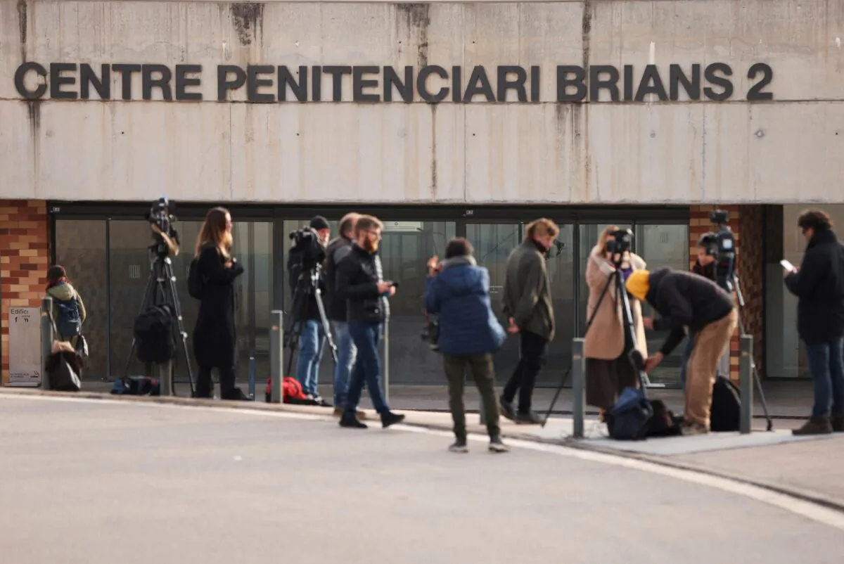 Members of the media stand in front of the entrance of Brians 2 prison where Brazilian soccer player Dani Alves was taken after a judge ordered him to be jailed on remand without bail over an alleged sexual assault of a woman in Barcelona, Spain, on Feb. 21, 2023. (Nacho Doce/Reuters)