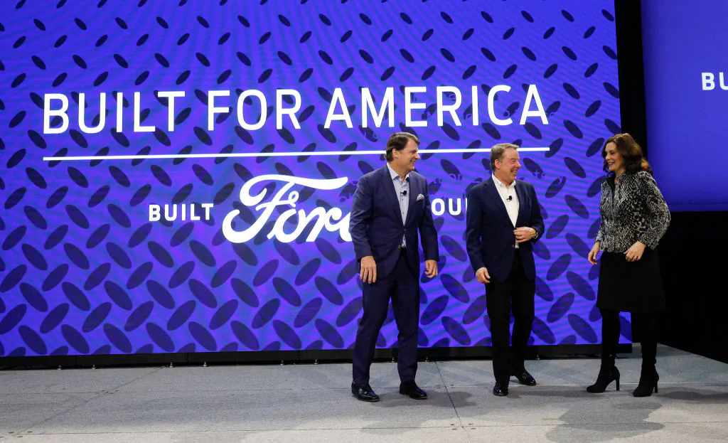 Ford CEO Jim Farley (left), Ford Executive Chairman Bill Ford (center), and Michigan Gov. Gretchen Whitmer take to the state for a photo after announcing at a press conference that Ford will be partnering with the worlds largest battery company, a China-based company called Contemporary Amperex Technology,  to create an electric-vehicle battery plant in Marshall, Mich., on Feb. 13, 2023. (Bill Pugliano/Getty Images)