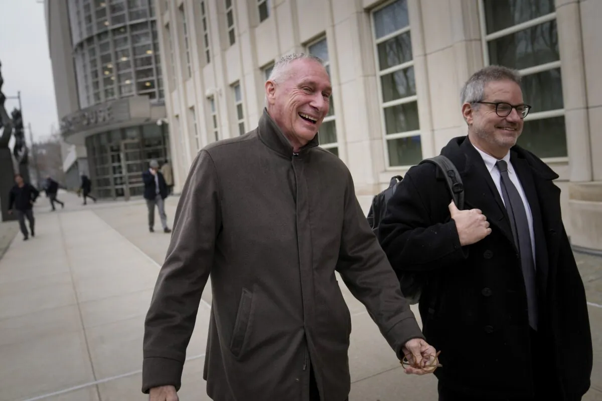 Former ESPN president John Skipper leaves federal court after testifying in a corruption case in New York on Feb. 21, 2023. (John Minchillo/AP Photo)