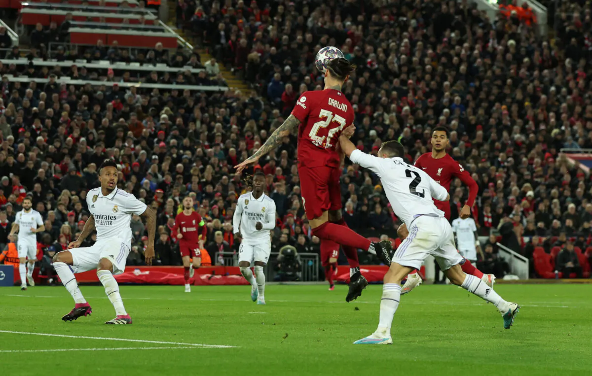 Liverpool's Darwin Nunez in action with Real Madrid's Dani Carvajal during the Champions League-Round of 16 First Leg-Liverpool v Real Madrid soccer match at Anfield in Liverpool, Britain, on Feb. 21, 2023. (Phil Noble/Reuters)