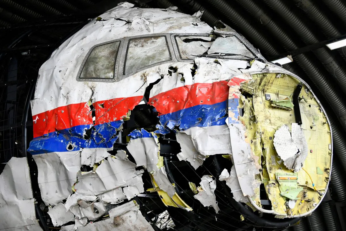 View of the MH17 wreckage as judges inspect its reconstruction as part of the murder trial ahead of the beginning of a critical stage in Reijen, Netherlands, on May 26, 2021. (Piroschka van de Wouw/Pool/Reuters)