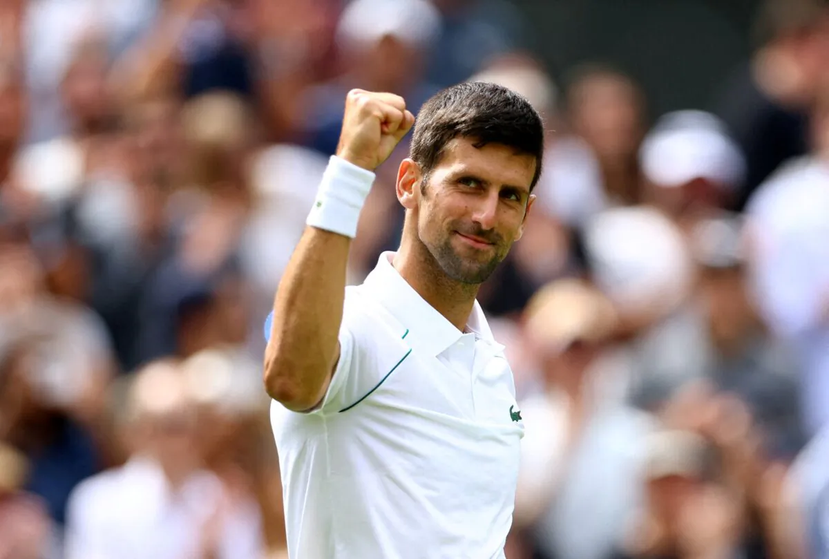 Serbia'a Novak Djokovic celebrates winning his second round match against Australia's Thanasi Kokkinakis during Wimbledon, in All England Lawn Tennis and Croquet Club, London on June 29, 2022. (Hannah Mckay/Reuters)