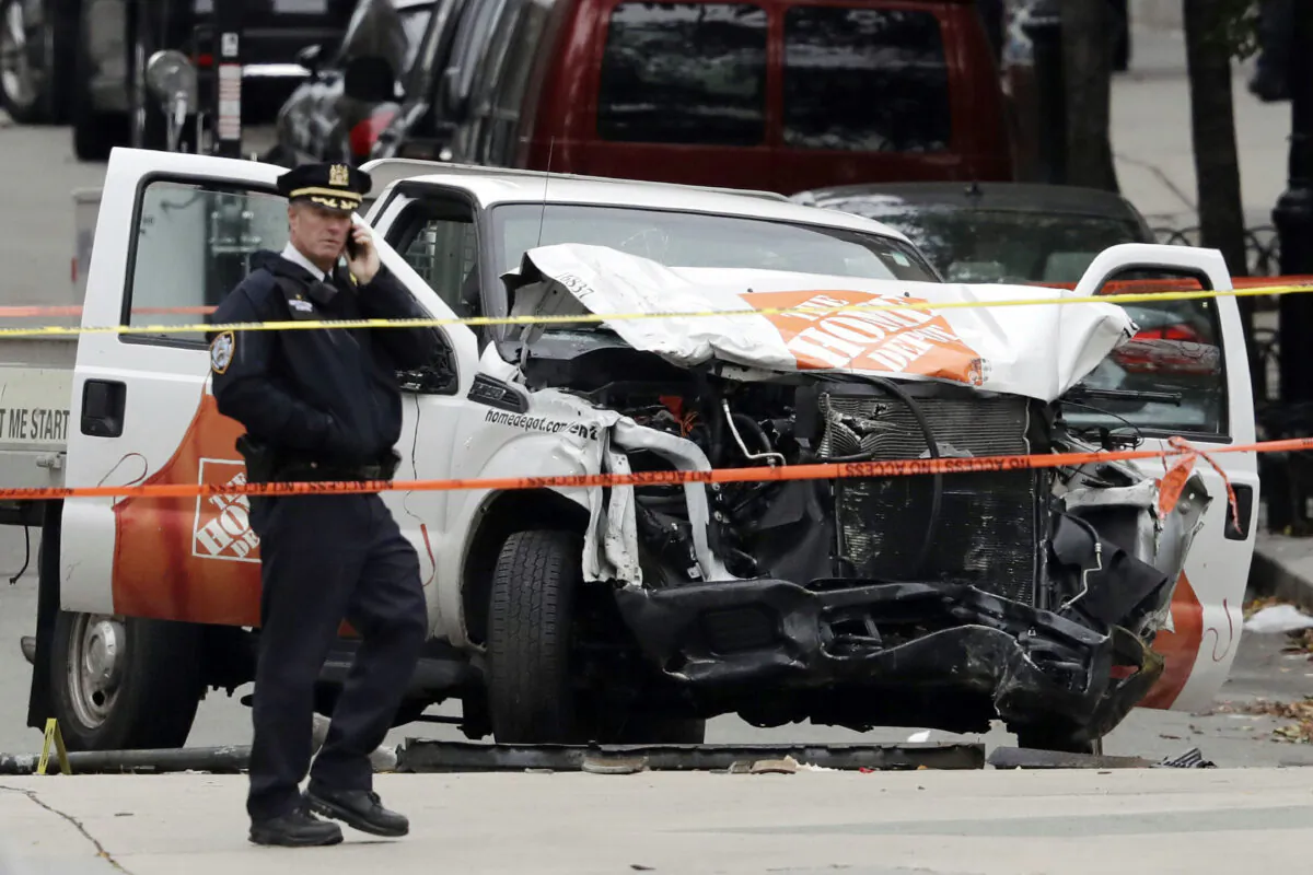 A damaged Home Depot truck remains on the scene after the driver mowed down people on a riverfront bike path near the World Trade Center in New York on Nov. 1, 2017. (Mark Lennihan/AP Photo)