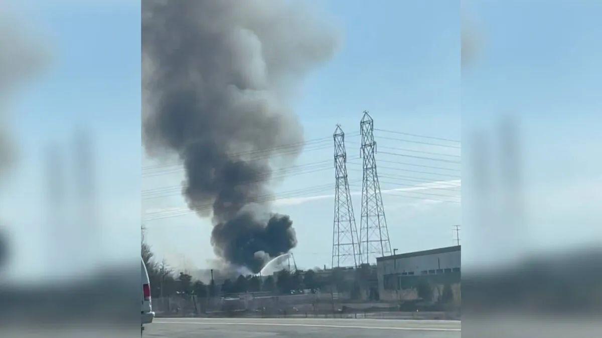 Smoke rises from a metal manufacturing plant after an explosion in Bedford, Ohio, on Feb. 20, 2023. (Eric Downing/Reuters)