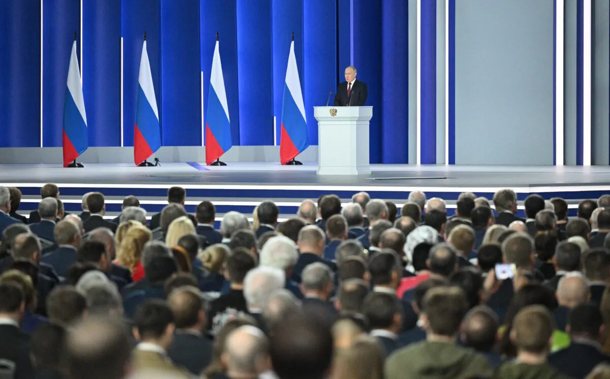 Russian President Vladimir Putin delivers his annual state of the nation address at the Gostiny Dvor conference centre in central Moscow on February 21, 2023. (Ramil Sitdikov/SPUTNIK/AFP via Getty Images)