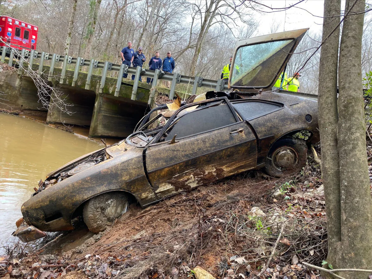The 1974 Pinto Kyle Clinkscales was driving when he disappeared in 1976 is recovered from a creek in Alabama in December 2021. (Maj. Terry "Tj" Wood/Chambers County Sheriff's Department via AP)